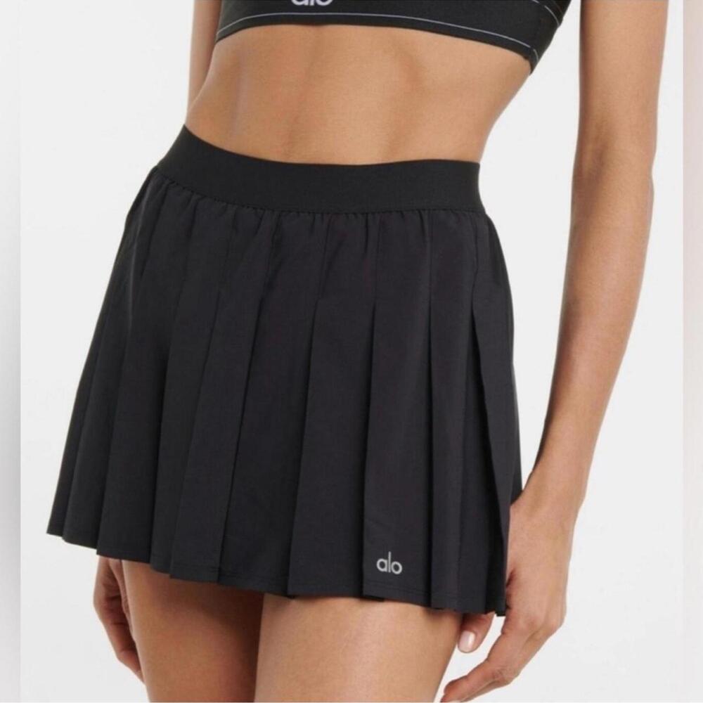 Alo varsity pleated tennis skirt in black.  Size M.  Perfect condition.